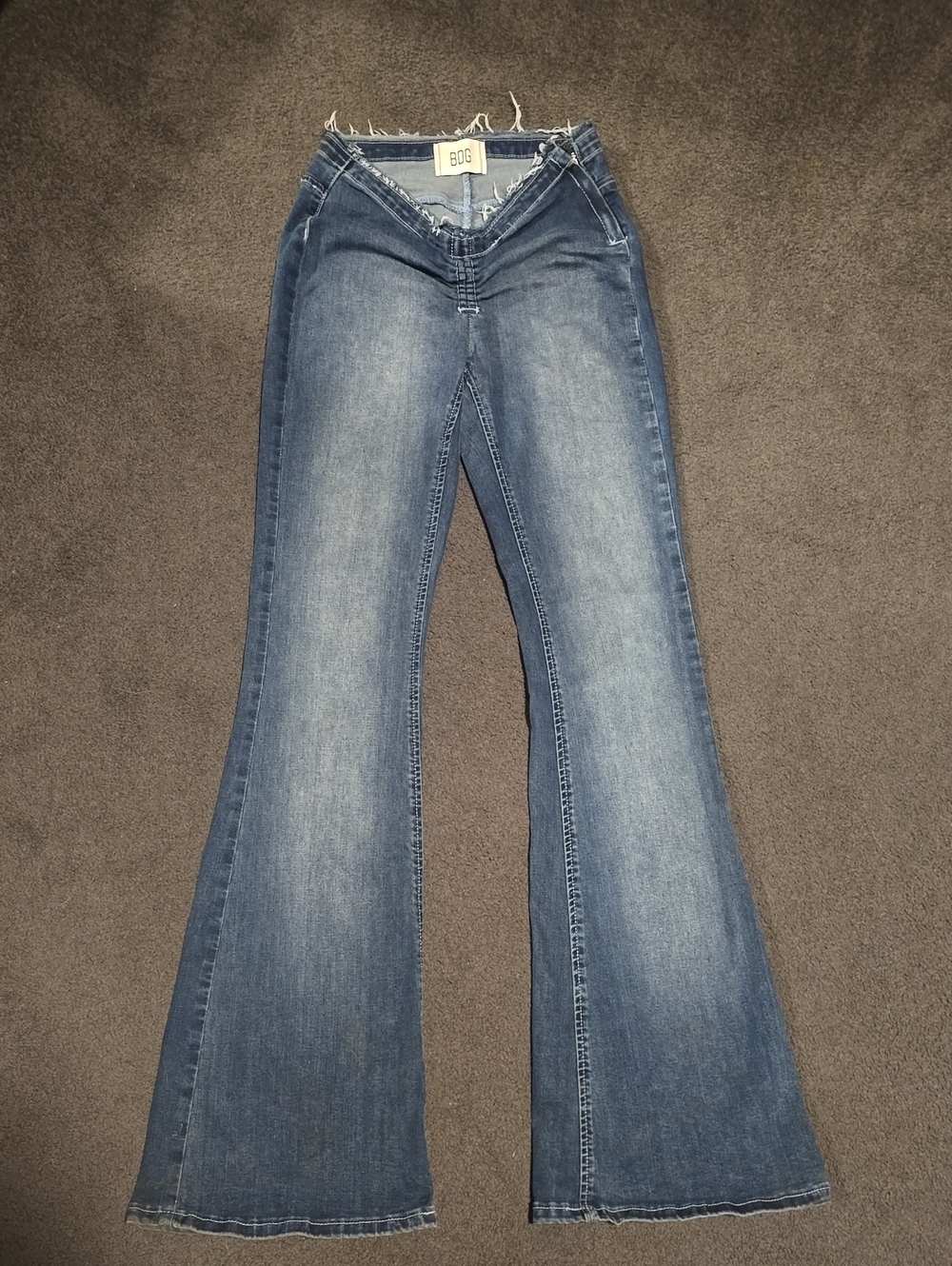 BDG Distressed Mid-Rise Flare Jeans in Faded Indigo